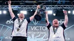 Littler and Humphries power England to sixth World Cup