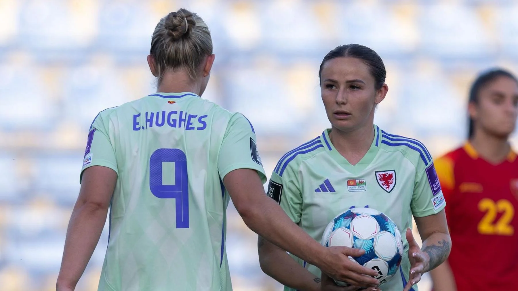 Elise Hughes and Hannah Cain during Wales' draw in Montenegro