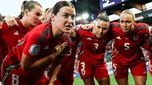 Wales captain Angharad James delivers a team talk at Euro 2025