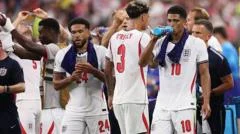 Fans boo, players adapt - the view on World Cup hydration breaks