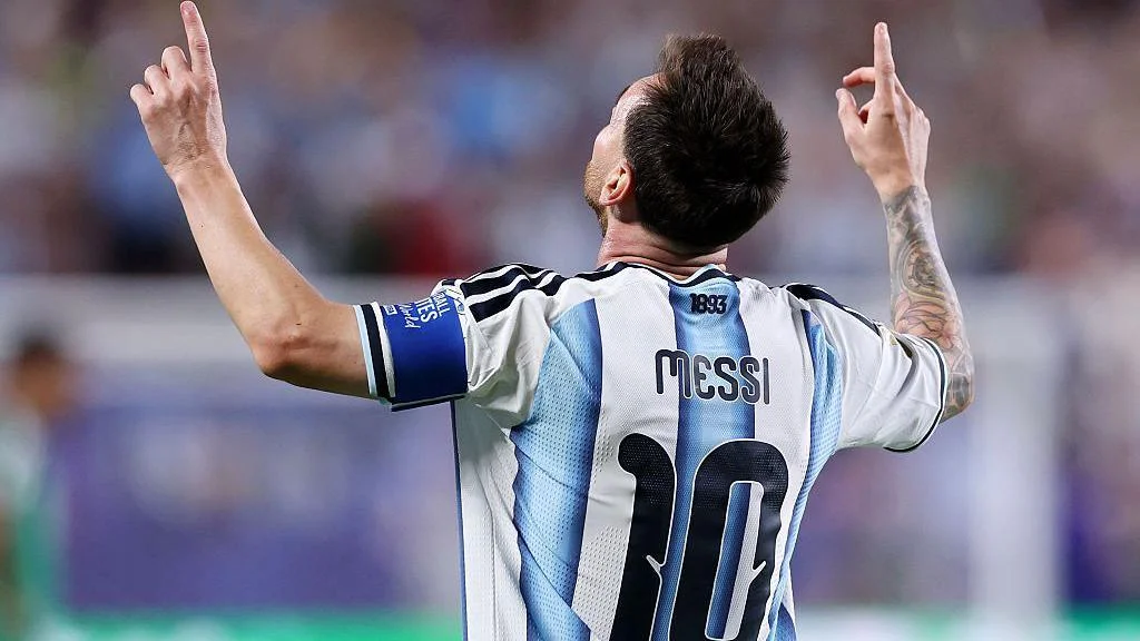 Lionel Messi points his fingers to the sky in celebration after scoring against Algeria in Argentina's 3-0 victory at the 2026 Fifa World Cup