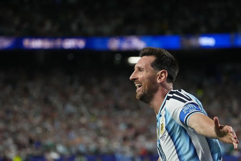 Lionel Messi celebrates