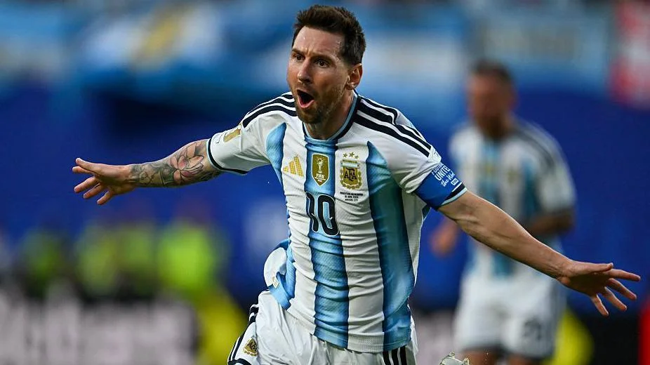 Lionel Messi celebrating scoring for Argentina