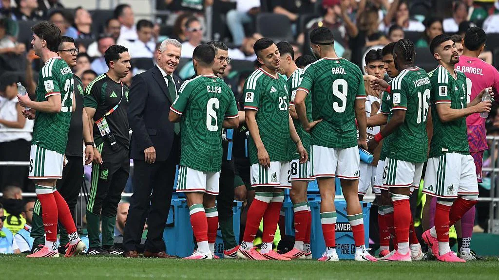 Mexico players drink near the touchline during the hydration break in the opening World Cup 2026 match against South Africa