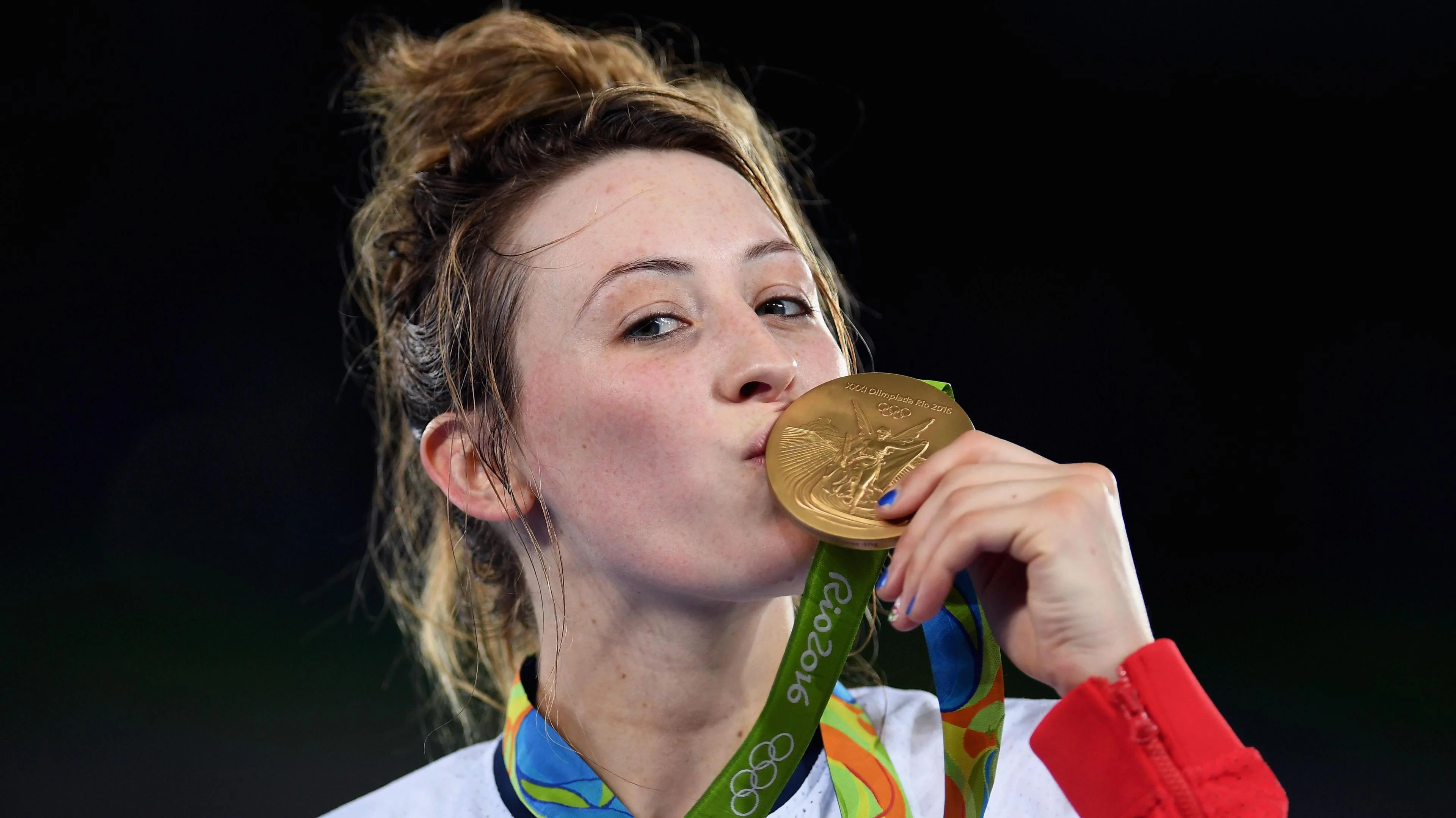 Jade Jones kisses Olympic taekwondo gold medal