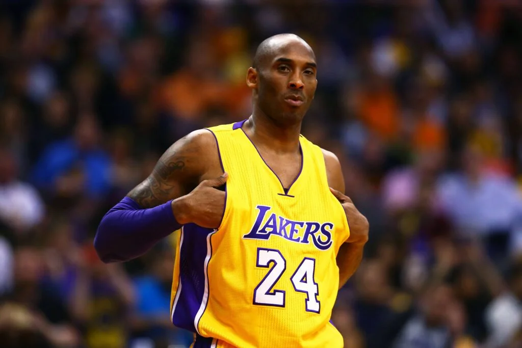Phoenix, AZ, USA; Los Angeles Lakers guard Kobe Bryant (24) reacts against the Phoenix Suns at Talking Stick Resort Arena. The Suns defeated the Lakers 119-107. Mandatory Credit: Mark J. Rebilas-USA TODAY Sports