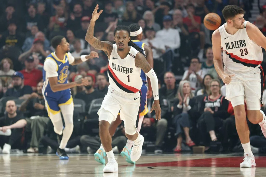 Oct 7, 2026; Portland, Oregon, USA; Portland Trail Blazers guard Ja Morant (1) reacts after scoring against the Golden State Warriors during the first half at Moda Center. Mandatory Credit: Jaime Valdez-Imagn Images